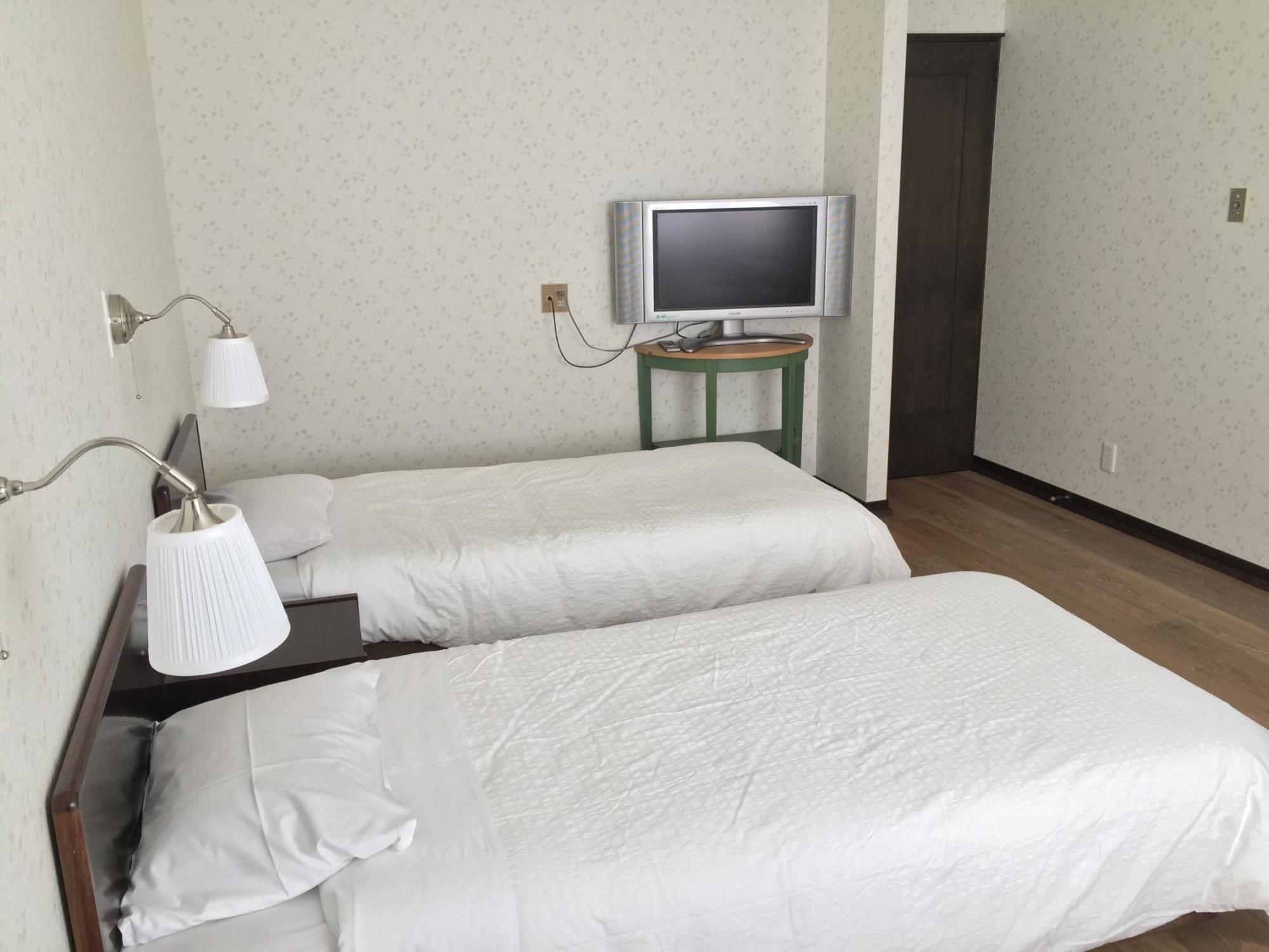 האצ'ימנטאי White Rose Inn חדר תמונה